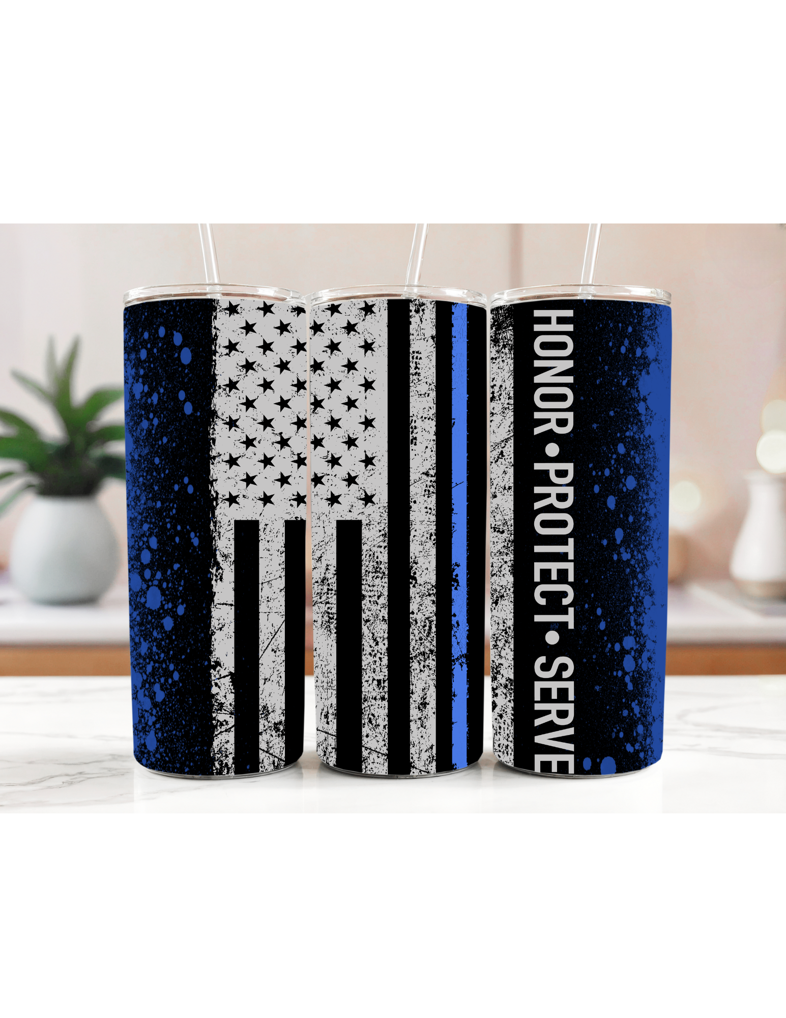 responders tumbler with patriotic design and honor protect serve text on a counter