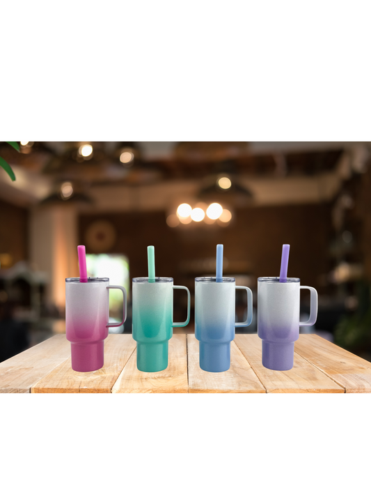 Colorful 2oz mini traveler tumblers with spill-proof lids and straws on a wooden table.