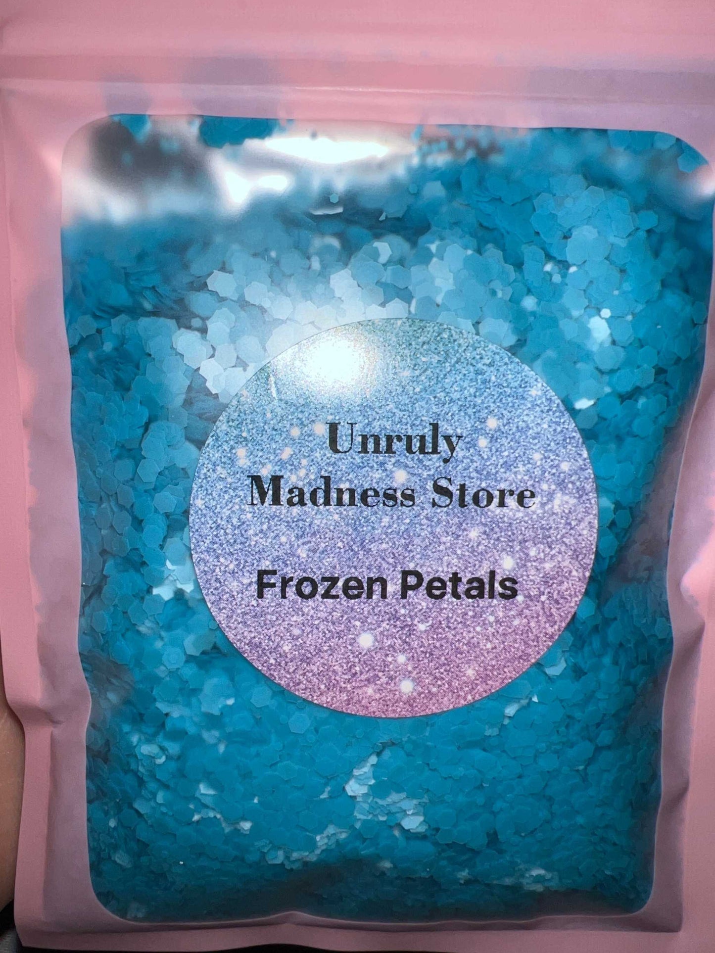 Frozen Petals 2oz blue polyester glitter in resealable packaging