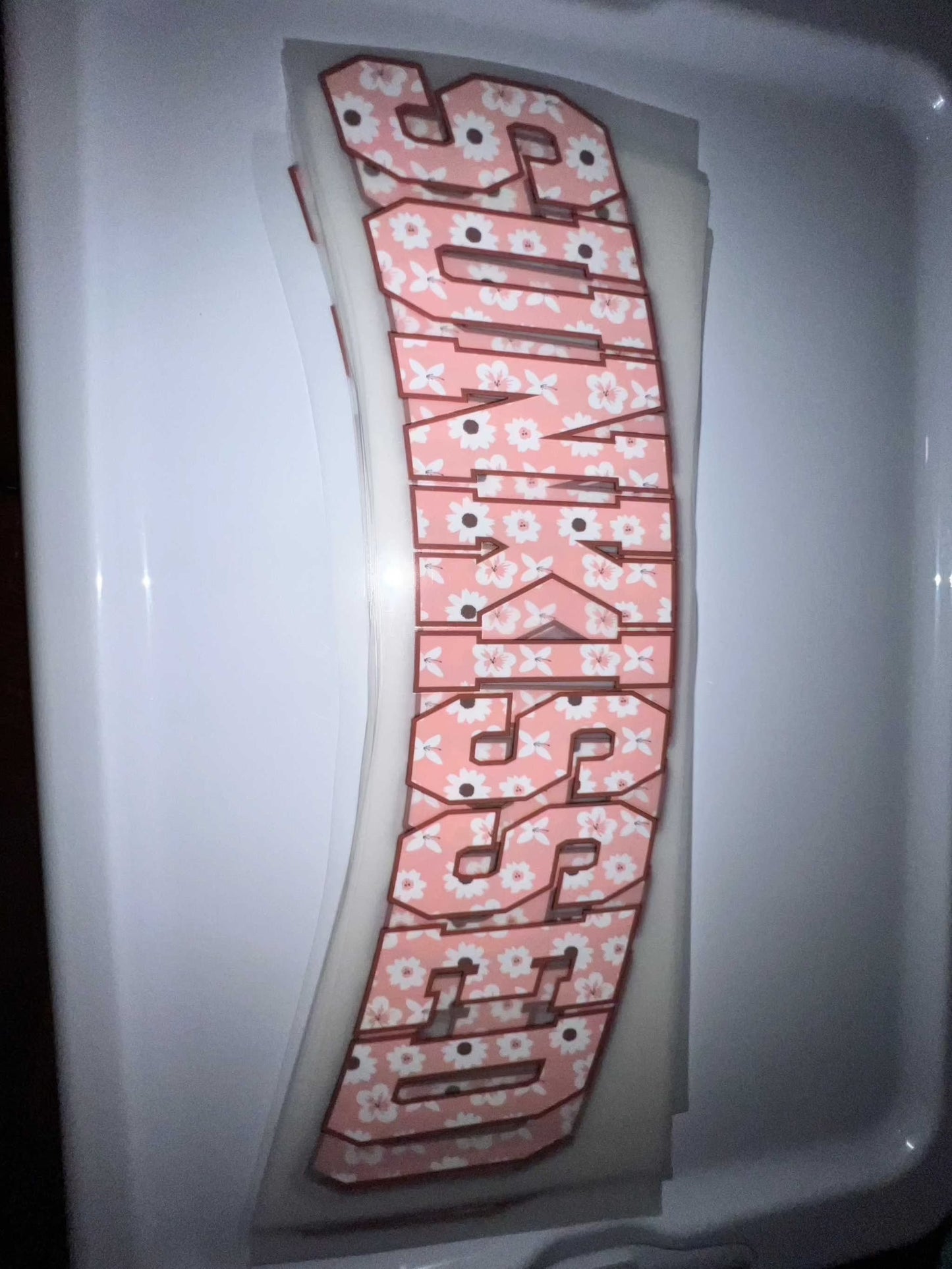 Stylish premade DTF transfer with floral pattern design, ready for heat press application.