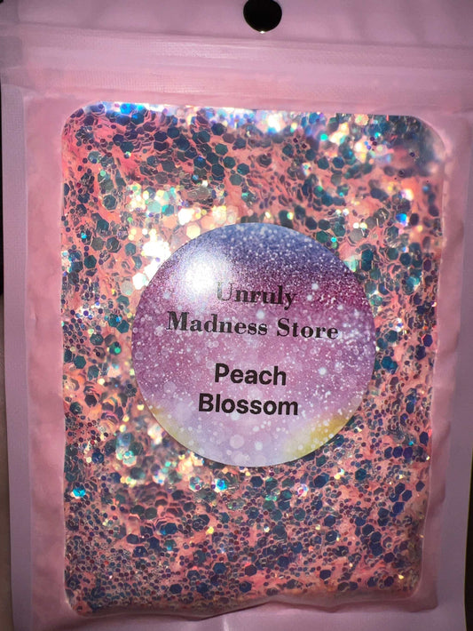 Peach Blossom 2oz polyester glitter in resealable pink bag with holographic accents
