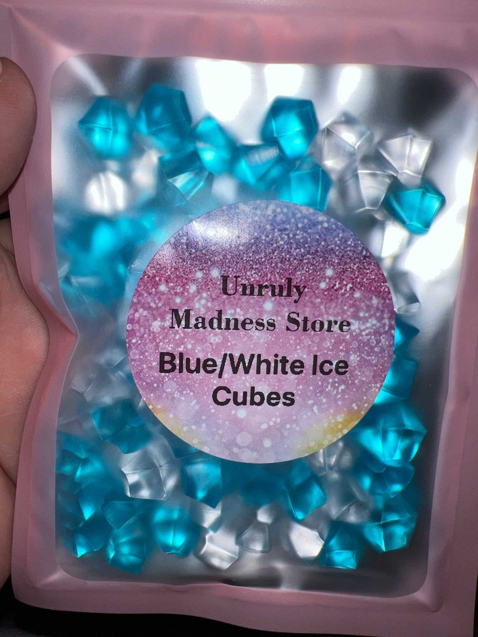 Blue and white 2 colored glitter polyester ice cubes in resealable packaging