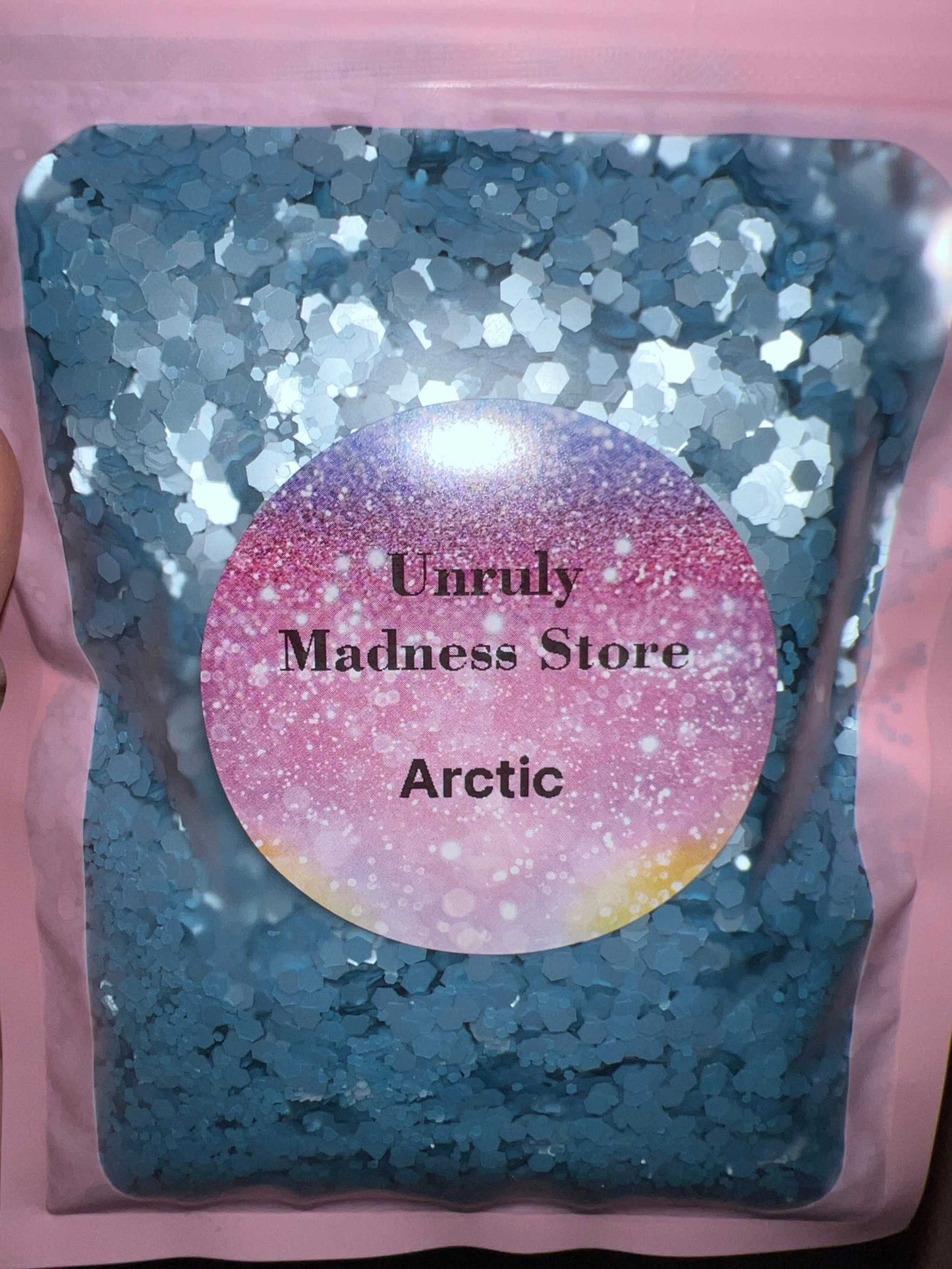 Arctic 2oz polyester glitter in hexagonal silver sparkle packaging