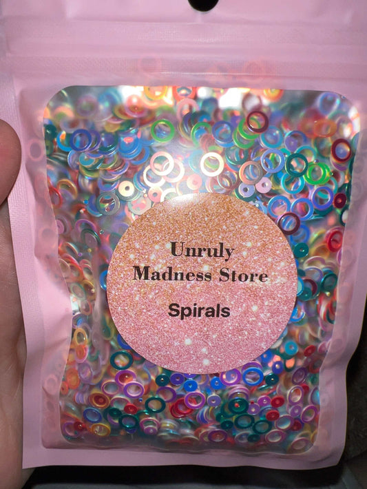 Spirals Glitter 2oz colorful spiral polyester glitter in resealable pink pouch