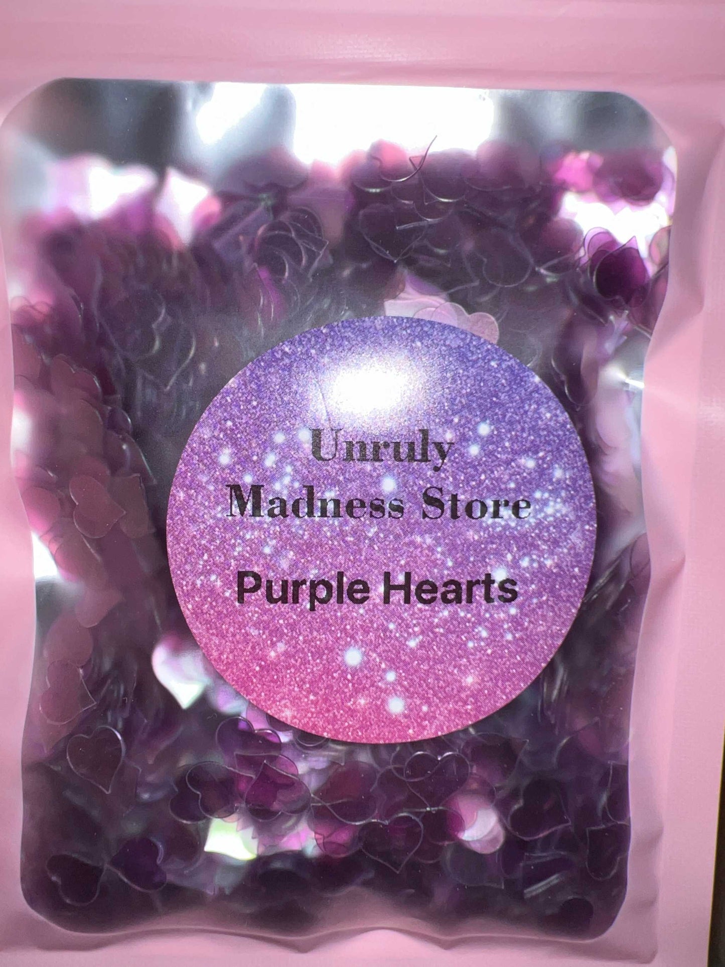 Purple Hearts Glitter 2oz polyester glitter in heart shapes in a pink resealable bag