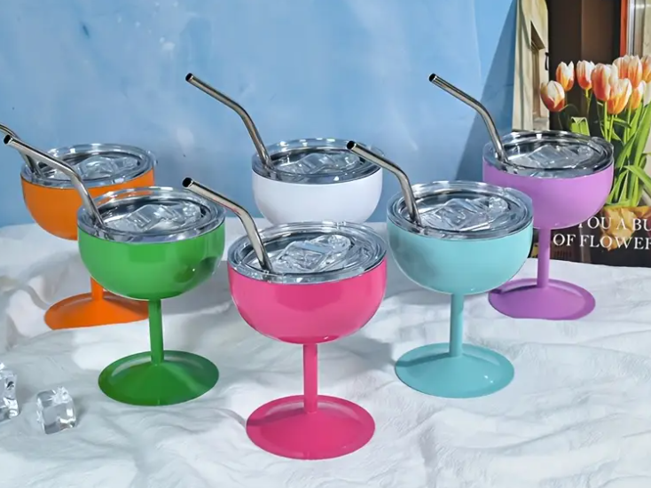 Colorful 4oz wine tumblers with lids and straws, designed for portable elegance.