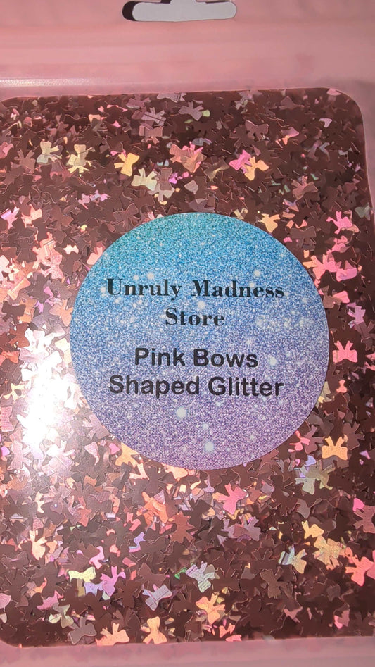 Pink bows shaped polyester glitter in 2oz package