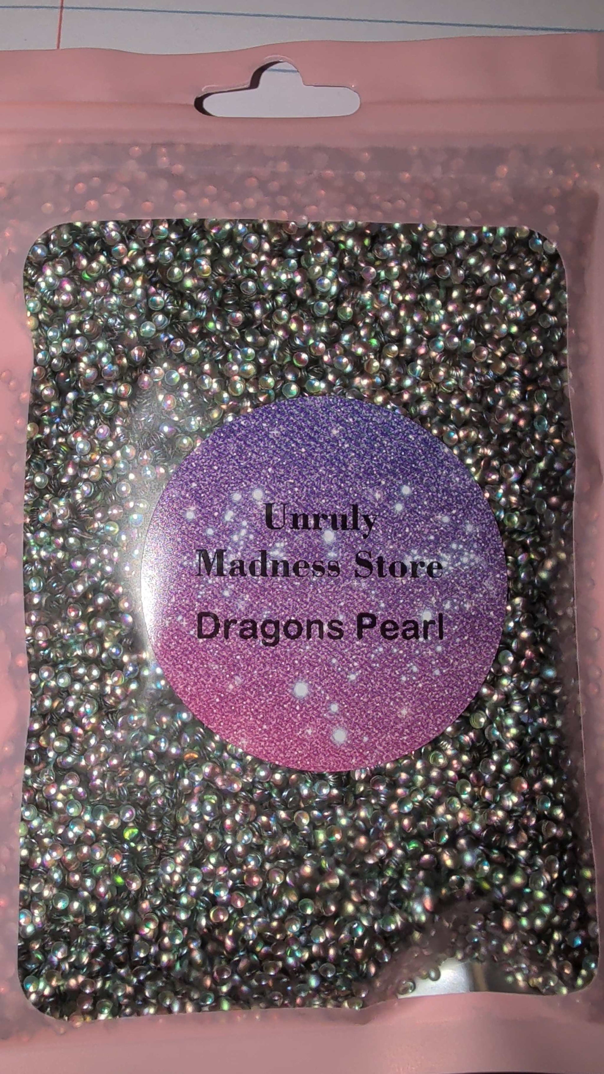Dragons Pearl 2oz polyester glitter in resealable pink pouch from Curly Madness Store