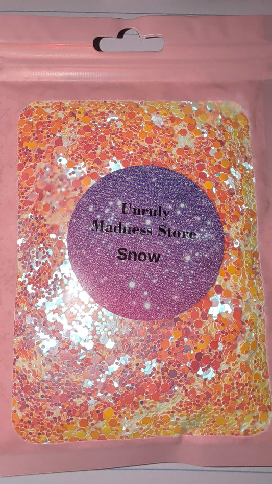 Color shifting snow polyester glitter in 2oz resealable pink packaging