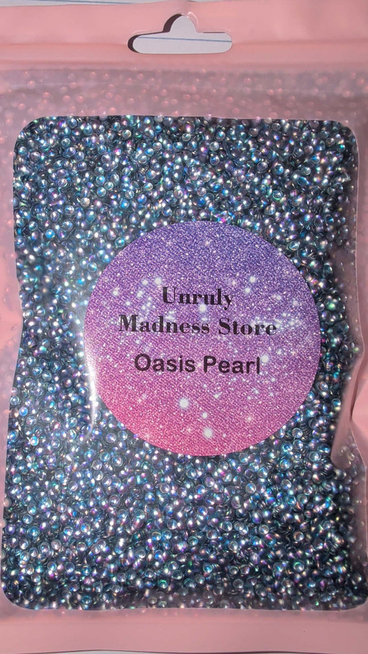 Oasis Pearl 2oz polyester glitter in iridescent pearl packaging