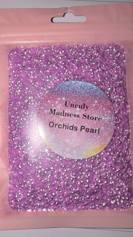 Orchids Pearl 2oz purple polyester glitter beads in resealable pink pouch