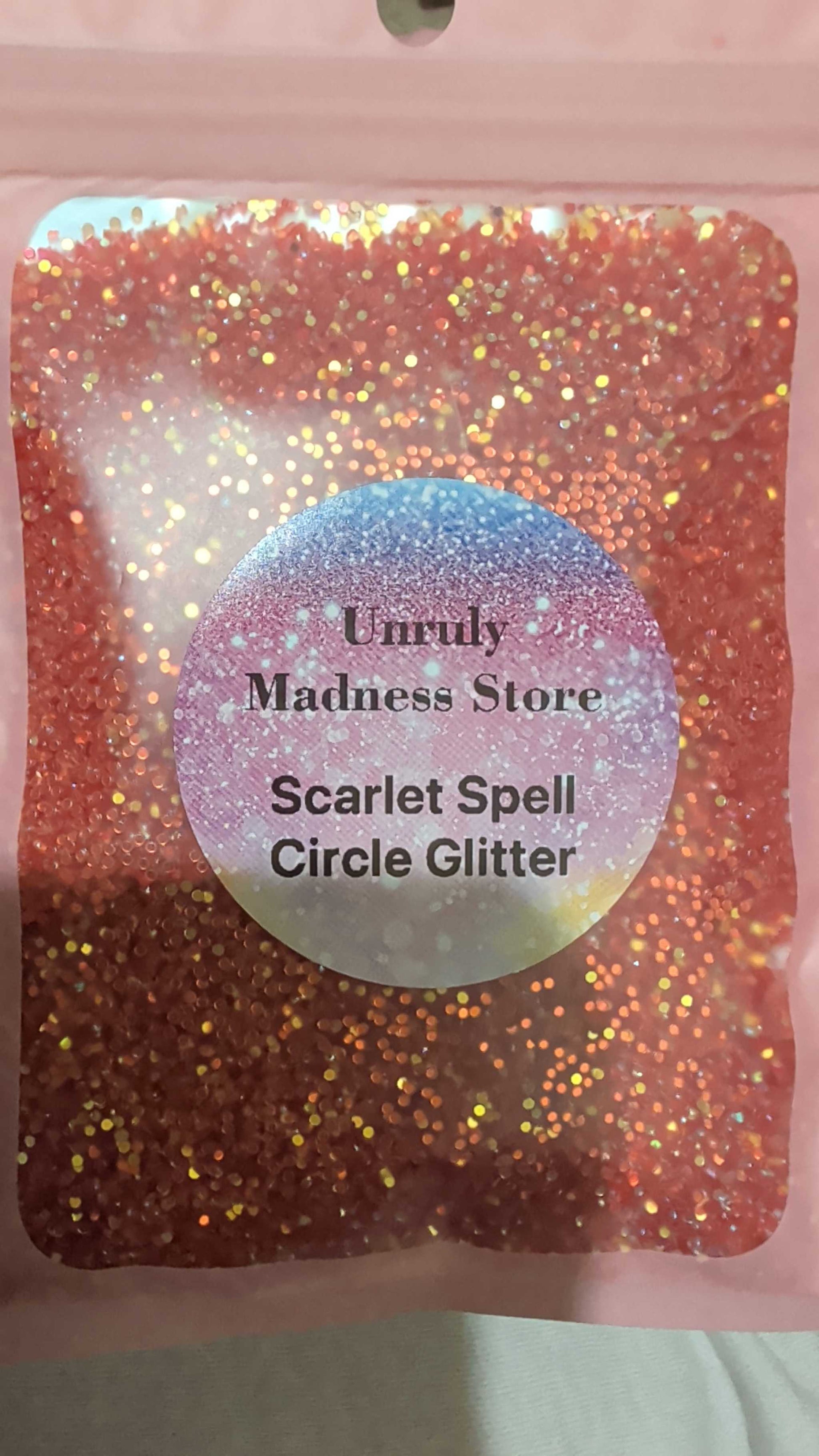 Scarlet Spell SM Circle Glitter 2oz polyester glitter in pink with gold sparkle in resealable pouch