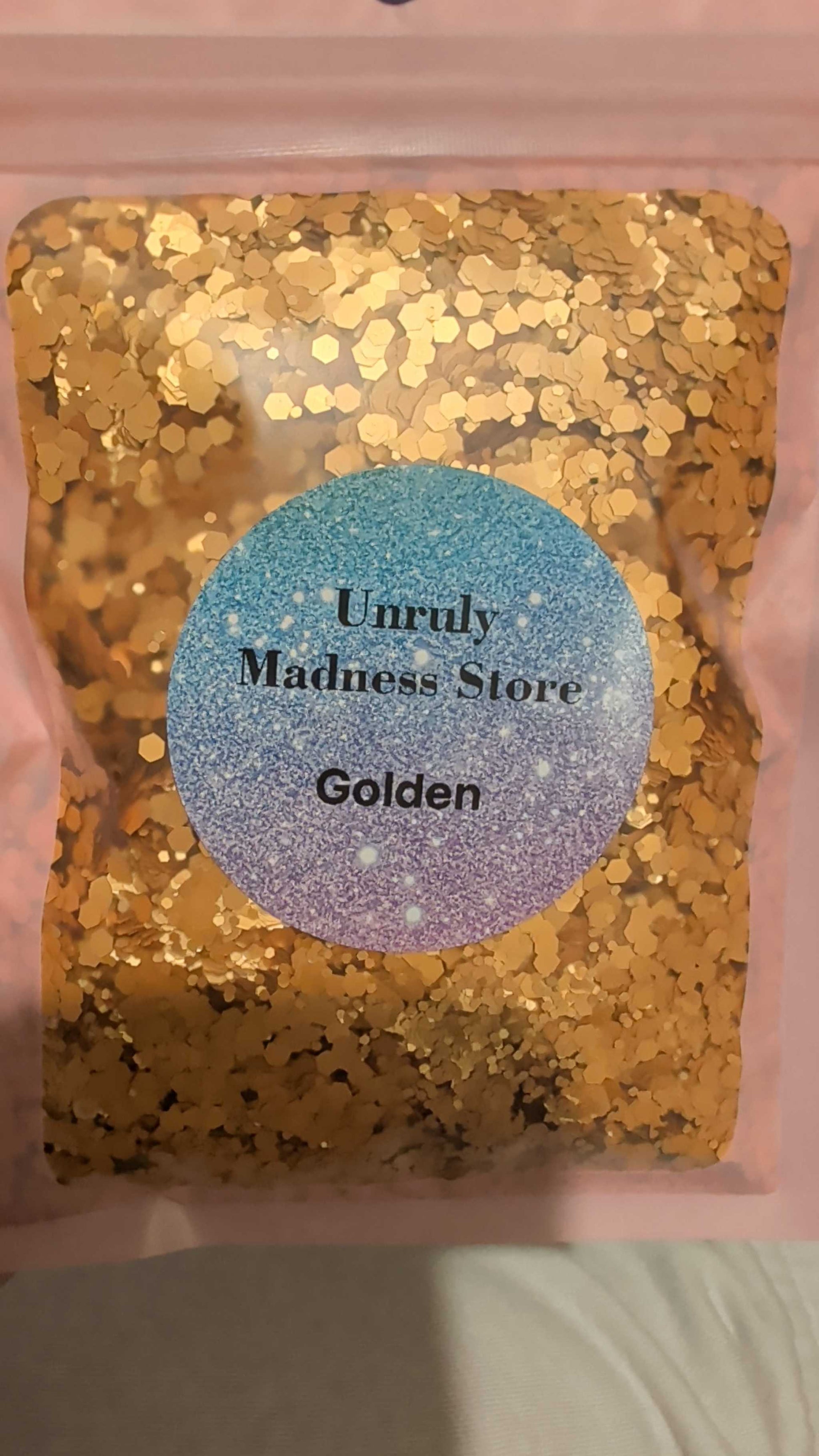 Golden 2oz polyester glitter in resealable bag from Unruly Madness Store