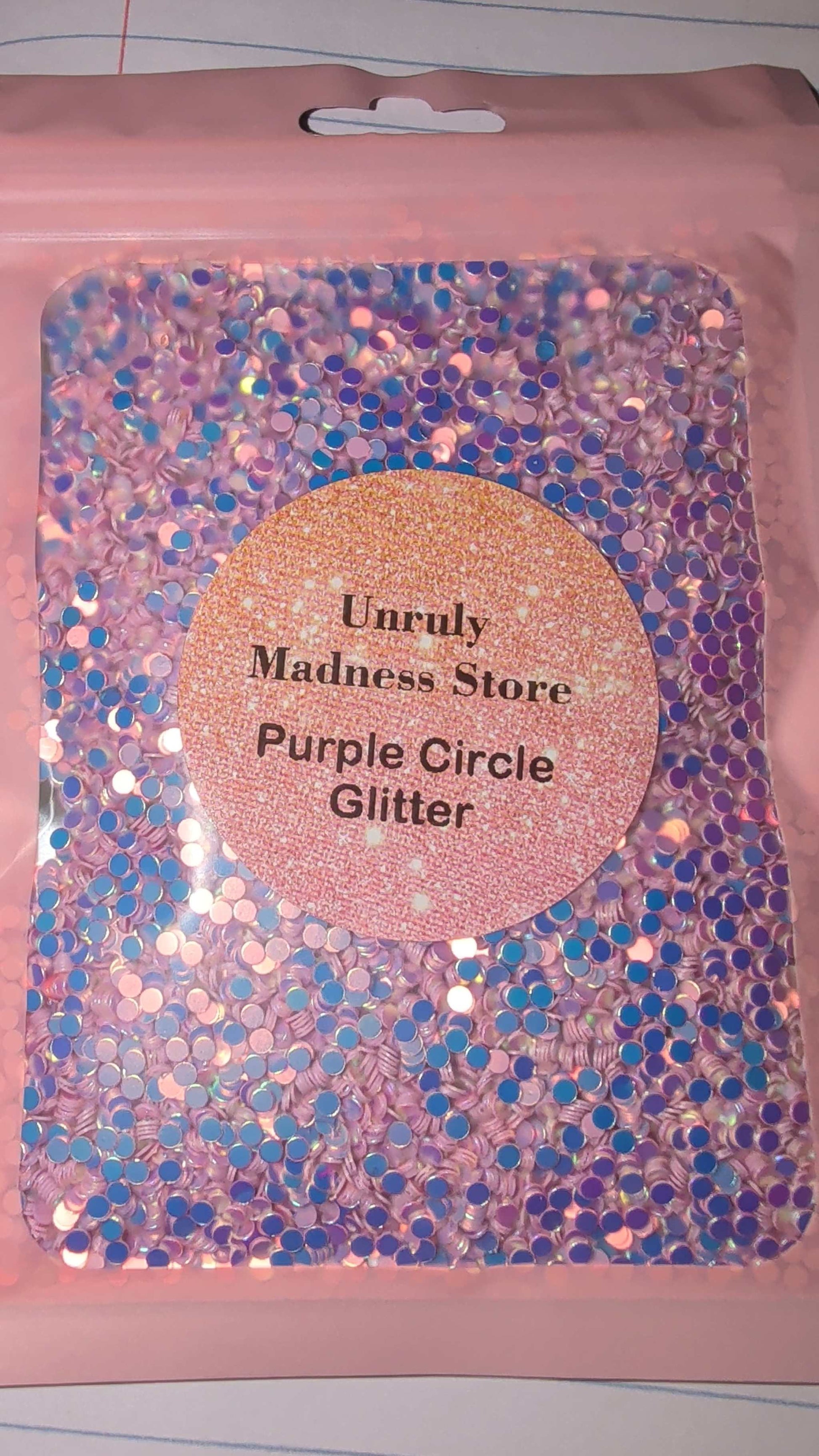 2oz bag of purple circle polyester glitter from Unruly Madness Store
